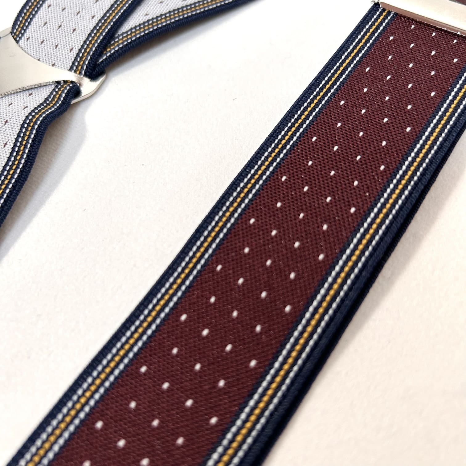 Garnet suspenders with white polka dots