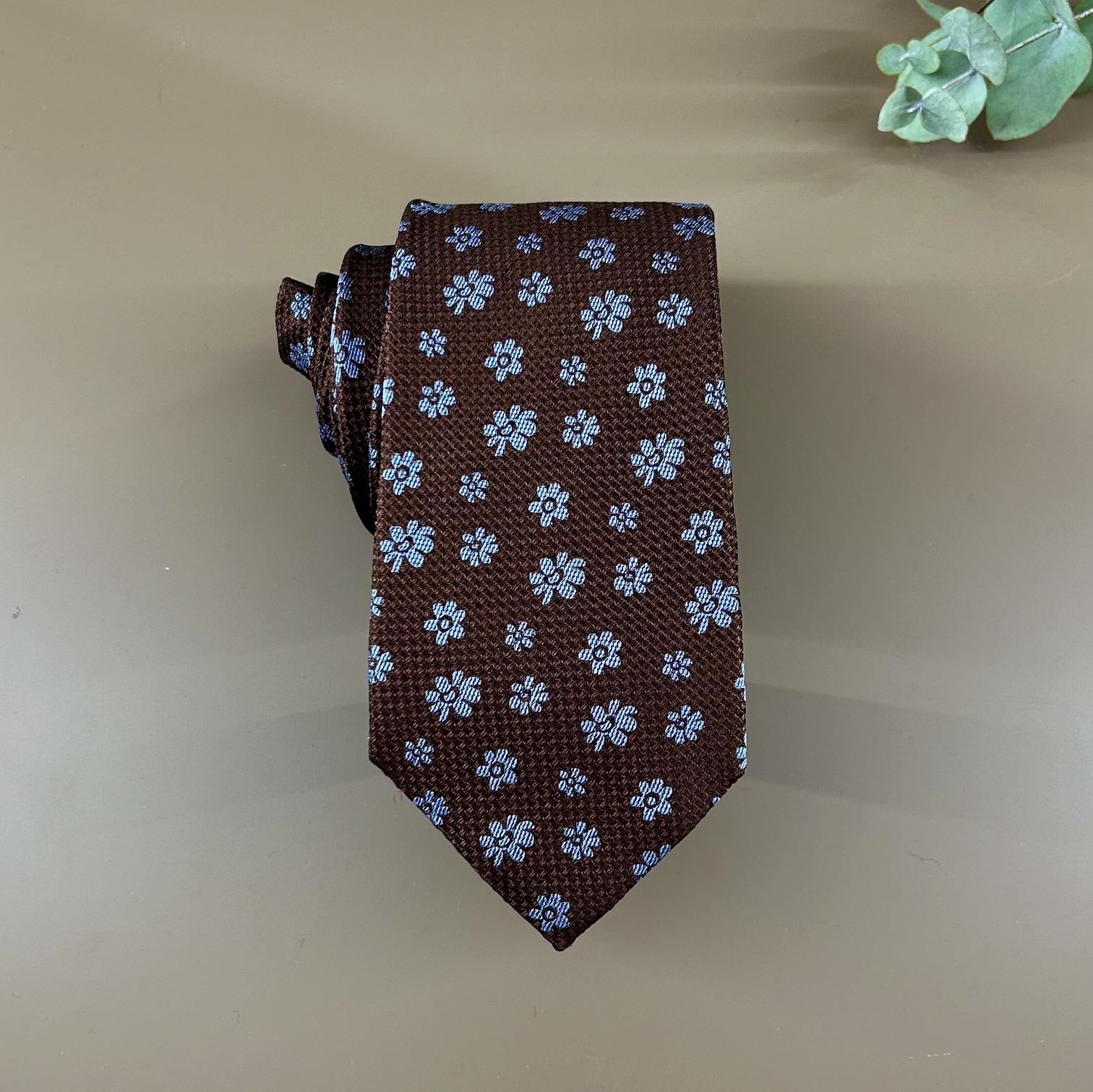 Chocolate brown tie with turquoise blue flowers