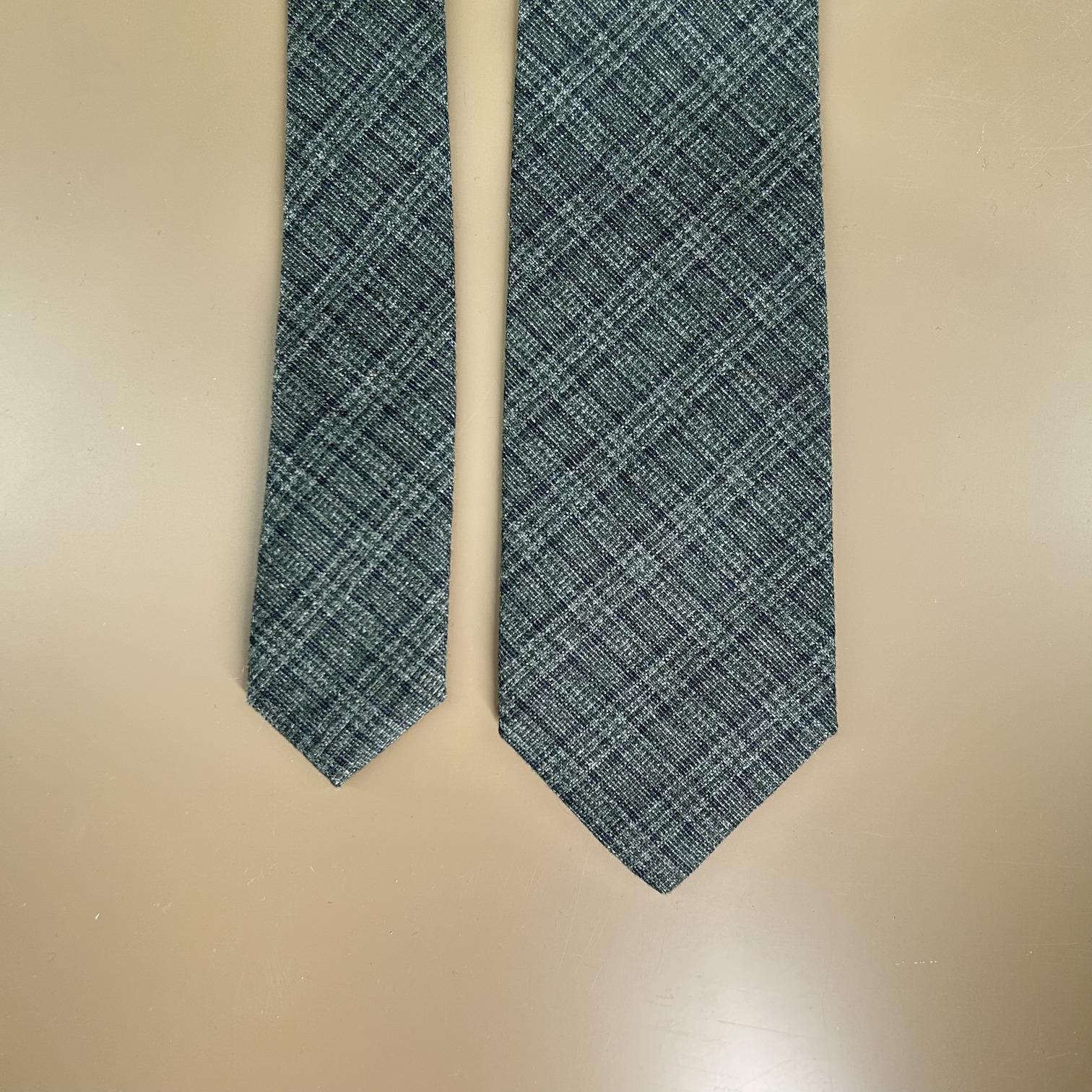 Greyish green tie in navy check