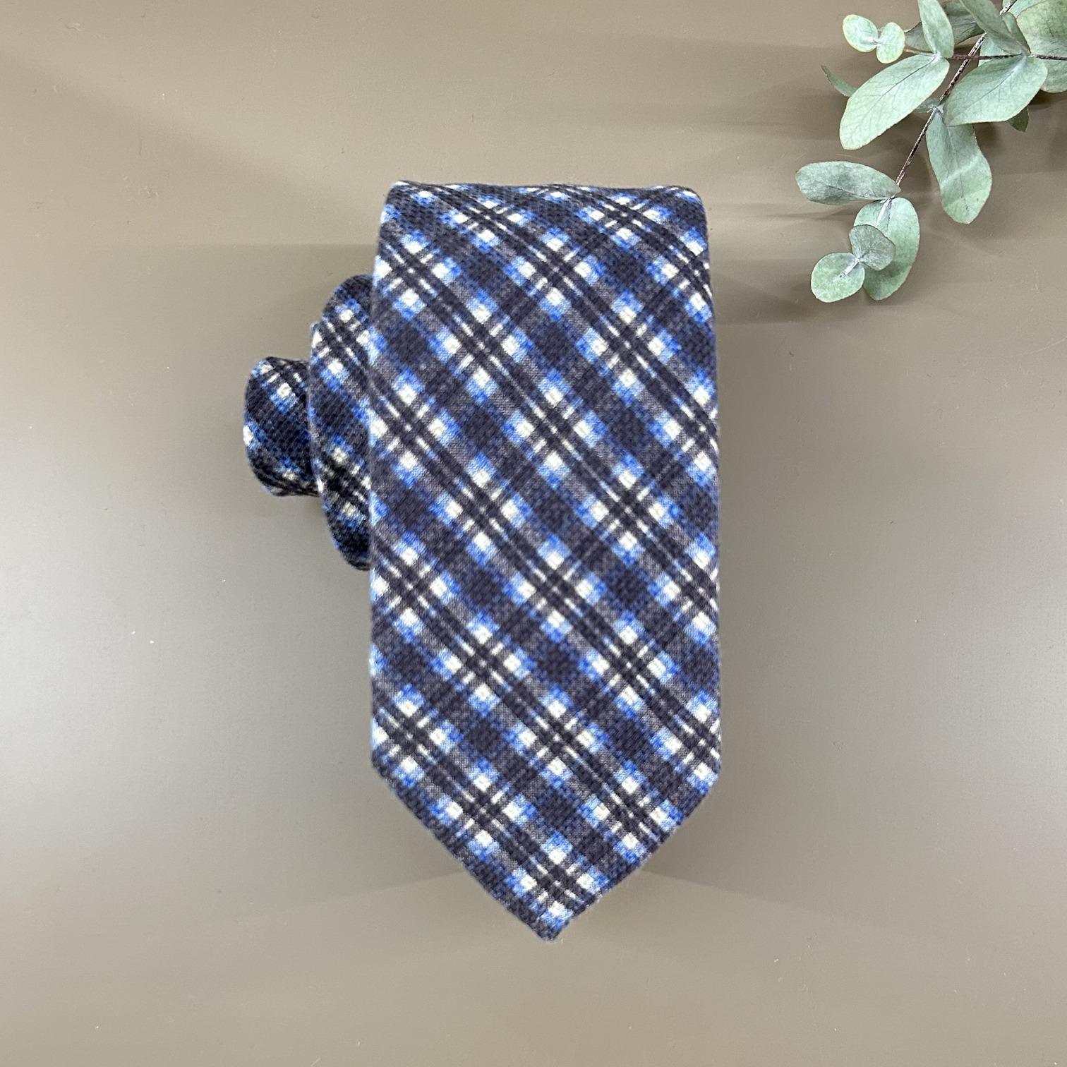 Blue wool tie with stripes and squares