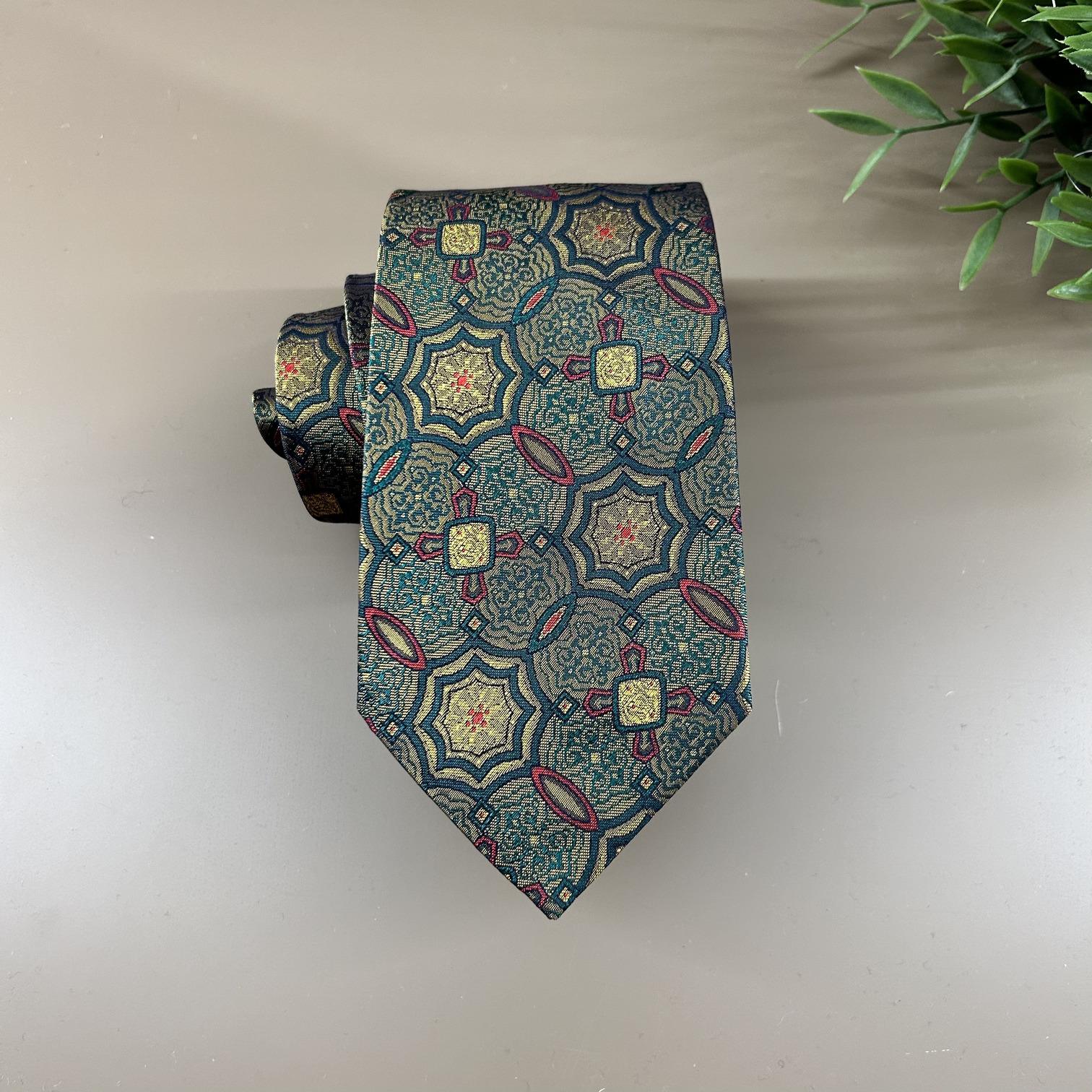 Geometric pattern tie in green, gold and burgundy