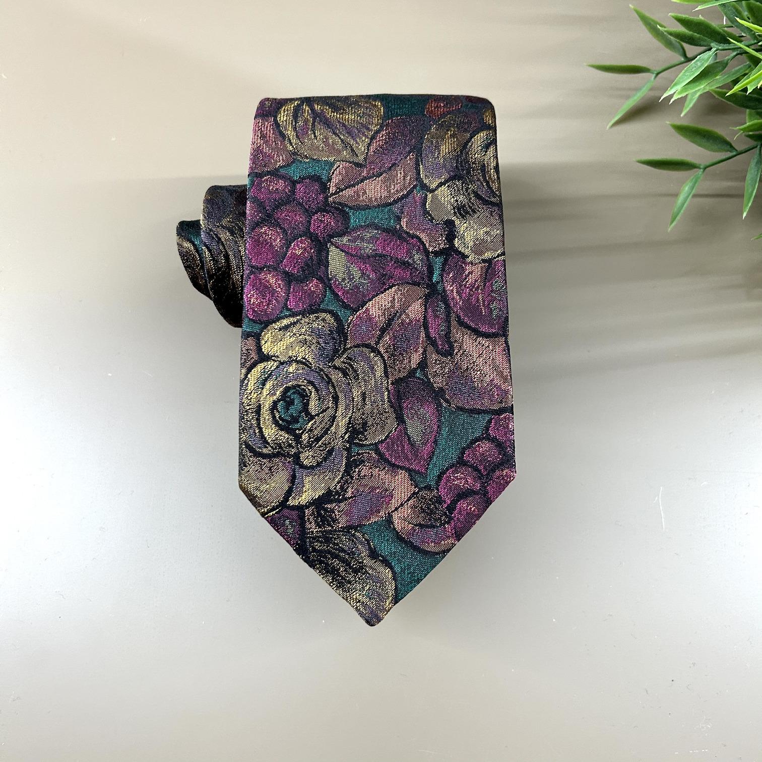 Vintage tie with green background, old gold and maroon flowers