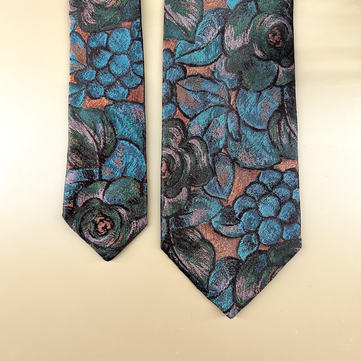 Ochre tie with green and turquoise roses