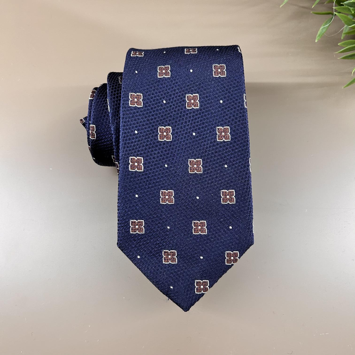 Corbata azul noche con puntos y flor marrón