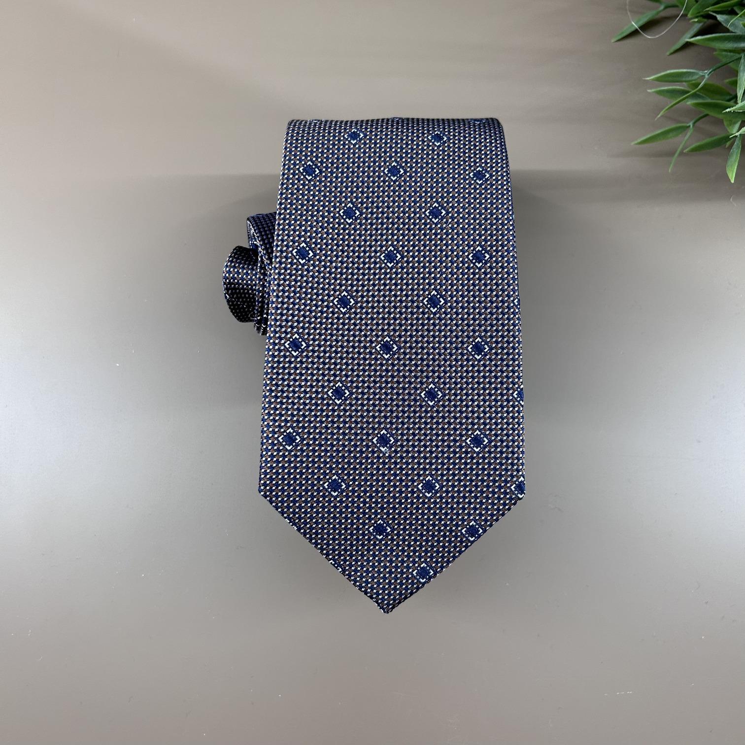 Silk tie with blue and brown polka dots